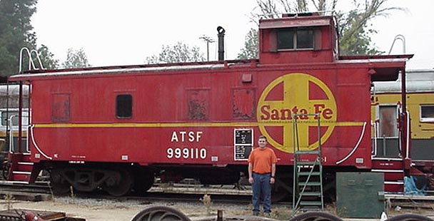 AT&SF 999110 at Travel Town; pictured for scale is SCSRA volunteer Jeff Barrow