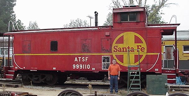 AT&SF 999110 at Travel Town; pictured for scale is SCSRA volunteer Jeff Barrow