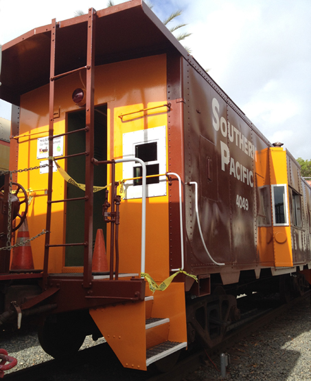 Former SP Caboose 4049, newly painted at Fullerton Railroad Days 2016 The Southern California Scenic Railway Association, Inc. (SCSRA) former  vintage caboose 4049 with brand-new paint job as of May 2016 Fullerton Railroad Days at Fullerton Amtrak Station