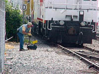 Caboose train gets switch set. Photo (c) Trainweb.com